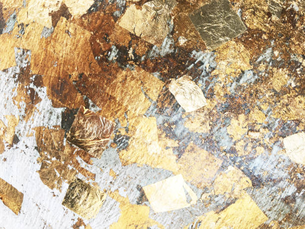 istock gold textured background from scraps of foil 1752005292