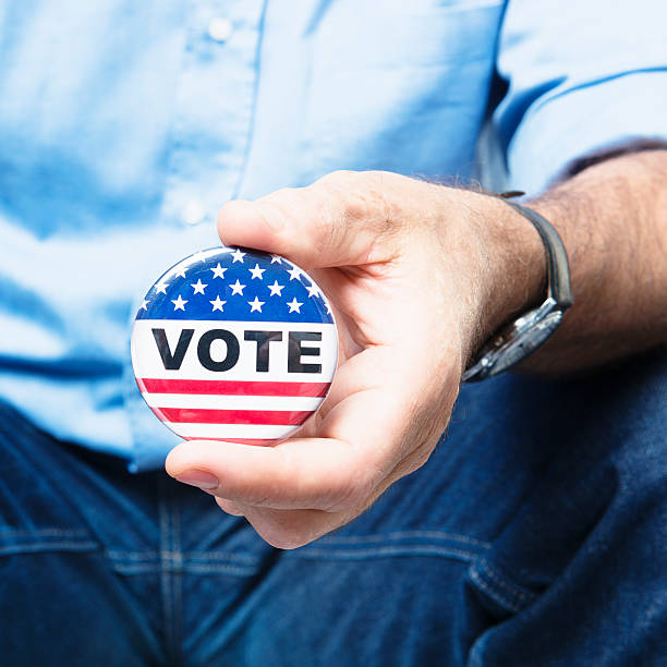 istock Casual man holding a vote button for the election 175200678