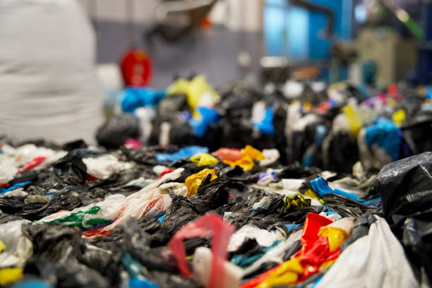 istock Stack of plastic residual mix waste in a plastic recycling factory 1752009109
