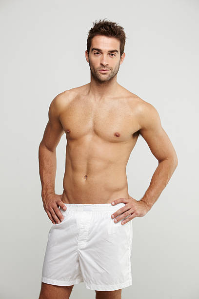 retrato de meados adulto homem de boxer shorts - shirtless imagens e fotografias de stock