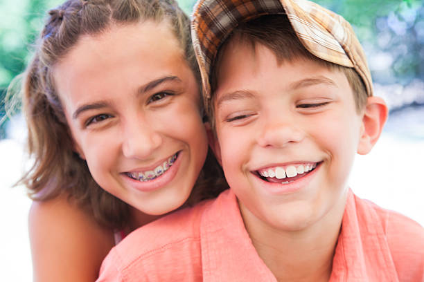 istock Happy brother and sister hugging each other 175201812