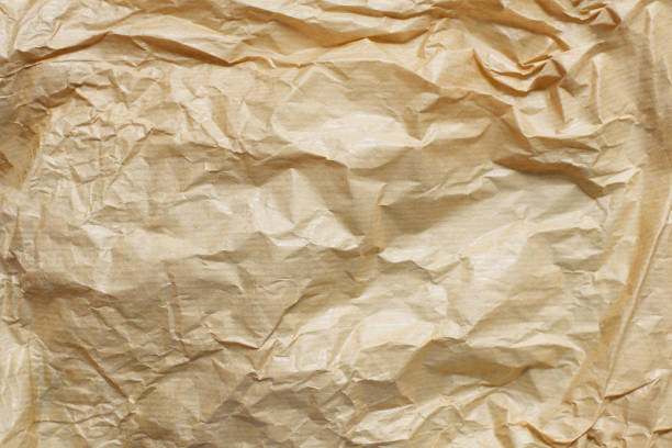 Crumpled paper background, wrinkle paper texture canvas.