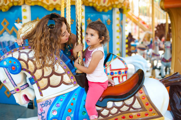 istock Merry Go Round and Little Girl 175202496