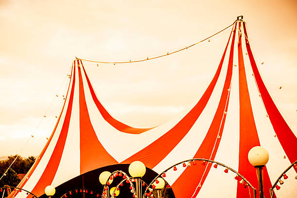 View of red and white striped circus tent top  stock photo