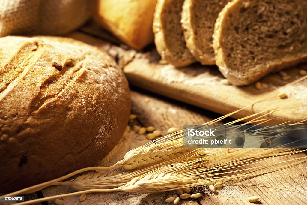 Bread still life Varius bread and wheat on the table Arrangement Stock Photo