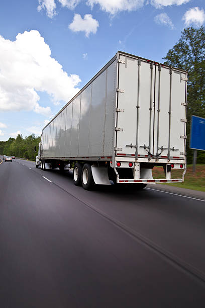 istock Truck driving on a highway 175202943