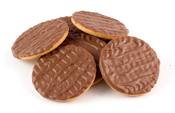 Chocolate coated biscuits Chocolate coated biscuits on a white background. chocolate cookies stock pictures, royalty-free photos & images