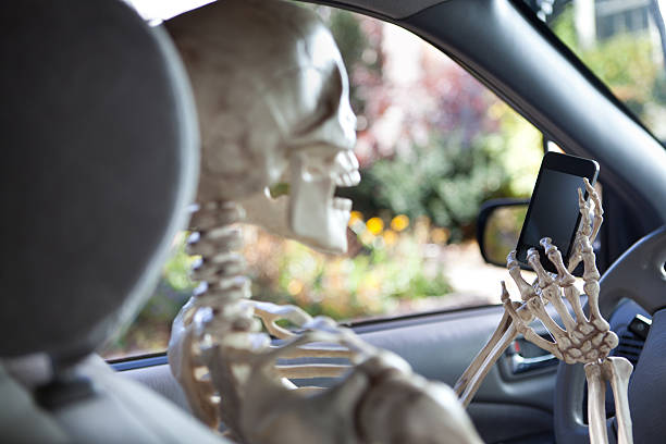 istock Driving and Texting on Mobile Phone in Car Hz 175203442