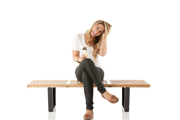 istock Beautiful young woman holding an ice cream 175203492