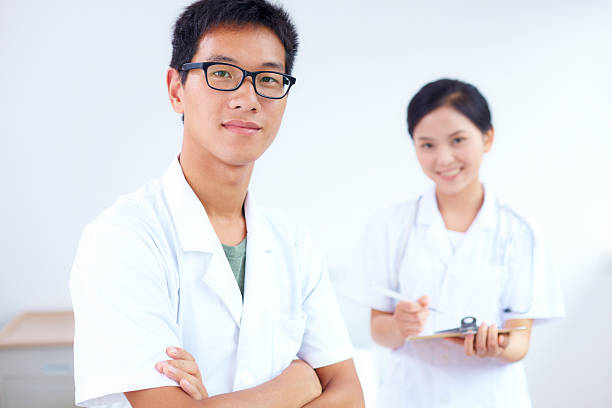 istock portrait of  young asian doctor looking at camera 175203821