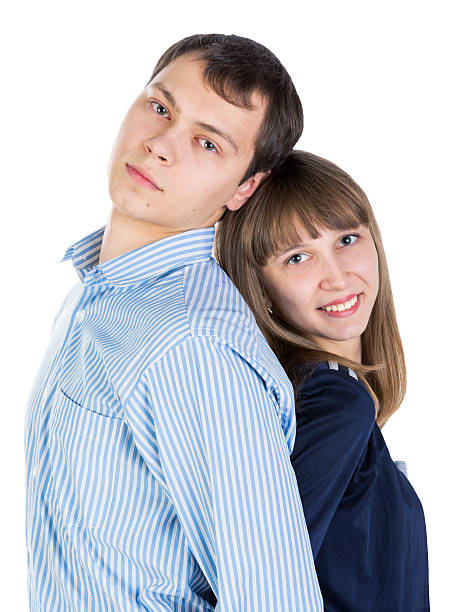 istock Young couple standing their backs to each other 175203858