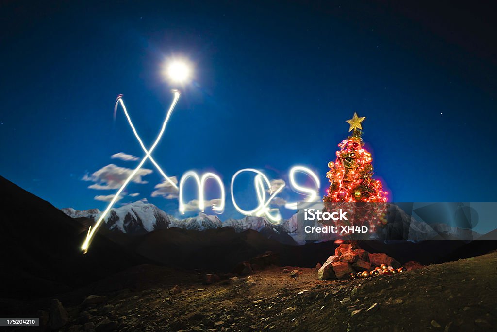 Pintura de luz con el árbol de navidad - Foto de stock de Adorno de navidad libre de derechos