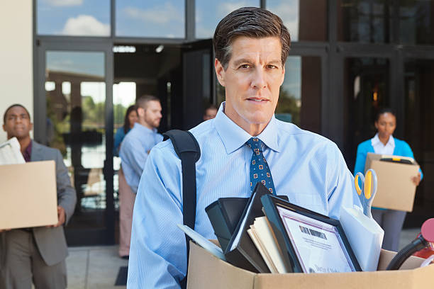 istock Mature unemployed man leaving office after layoff or being fired 175204777