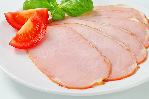 istock Slices of ham with basil and tomato 175205006