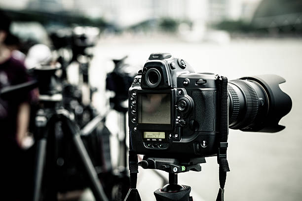 istock Digital SLR Cameras on Tripods 175205400