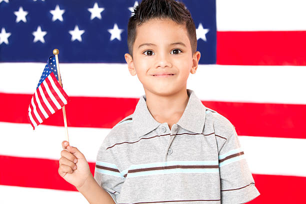 istock Little Boy Holding American Flag 175205654