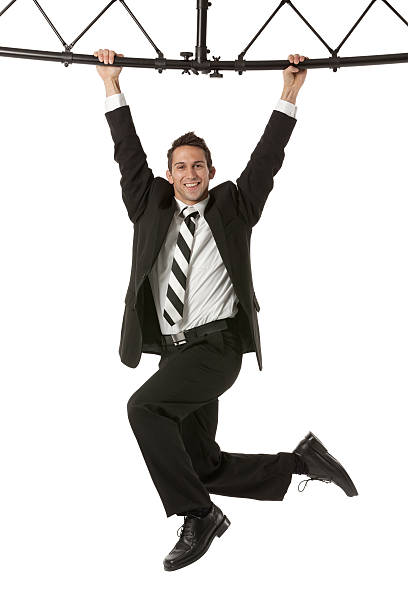 istock Businessman handing from a metal structure 175205771