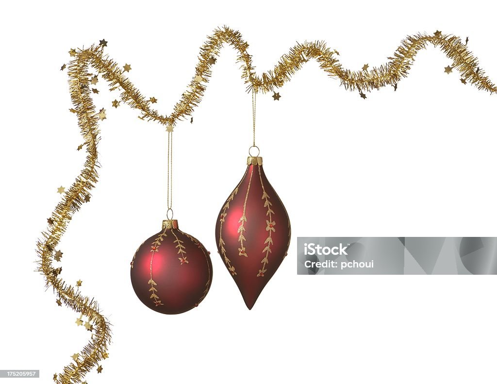 Christmas ornament Christmas baubles hanging on a golden ribbon on white background with copy space. Celebration Event Stock Photo