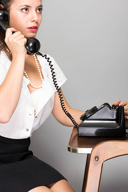 istock Woman with old telephone 175206604