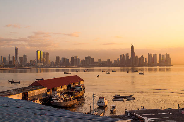 Panama City docks at dawn Panama City, Panama - March 9, 2009: View over the bay area of Panama at dawn with the city skyline int he background. casco viejo photos stock pictures, royalty-free photos & images