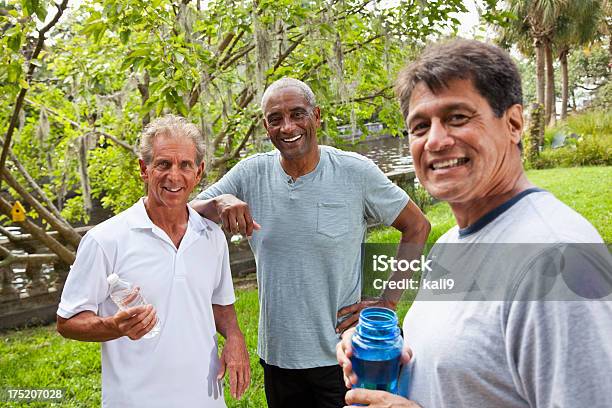 Men In Park After Exercising Stock Photo - Download Image Now - Mature Men, Men, Mature Adult