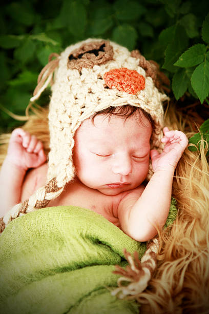 istock Sleeping Newborn Baby Wearing Owl Hat 175207275