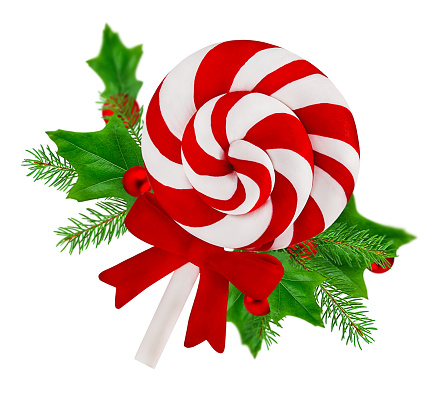 Christmas, round lollipop with a red ribbon and decoration in the form of a holly twig. Highlighted on a white background