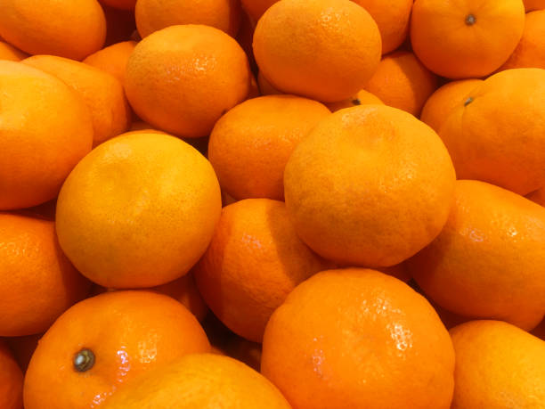 istock Fresh Oranges at the market, Fruits background 1752079501