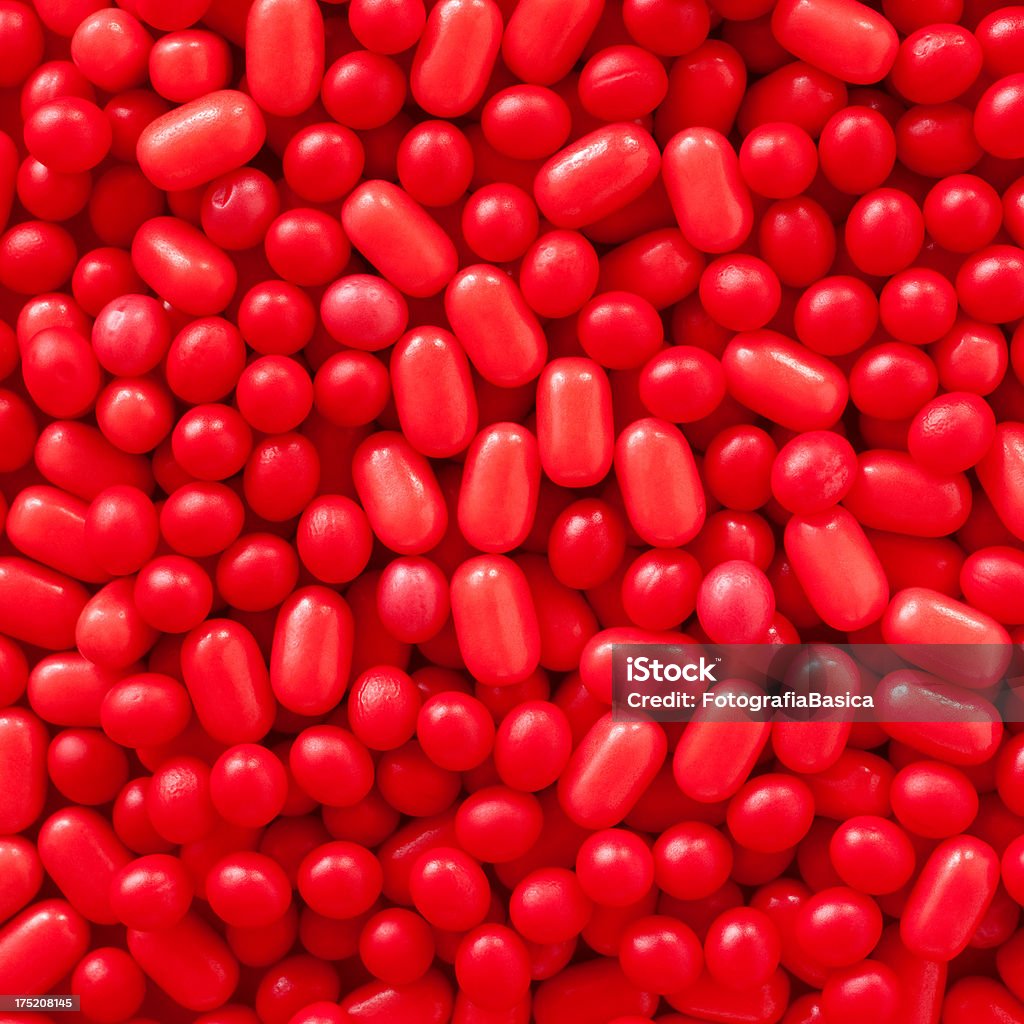 Red pills Lots of red little pills Capsule - Medicine Stock Photo