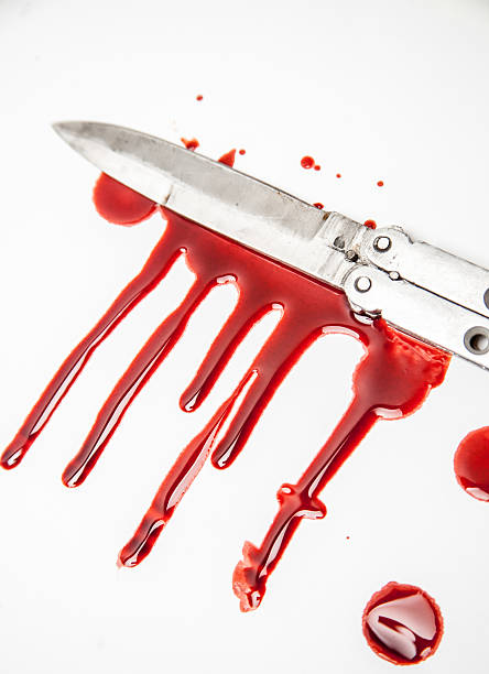 Bloody murder butterfly knife with plasma blood drips "A Bloody Butterfly knife with bloody blood drips on white, easy to cut out since it is on white." switchblade stock pictures, royalty-free photos & images