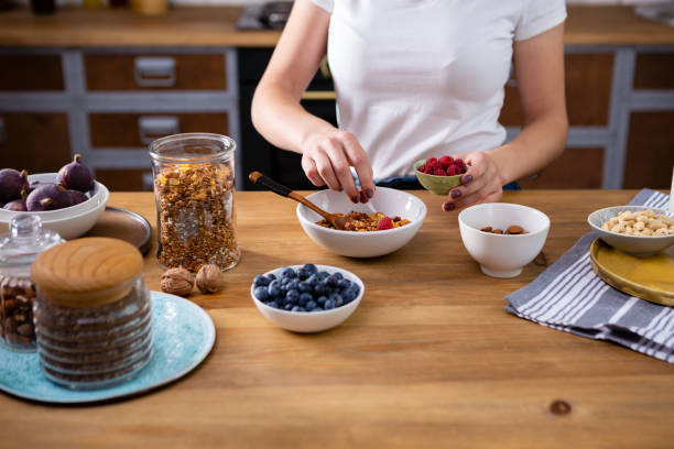 istock unrecognizable person without a face prepares breakfast 1752088967