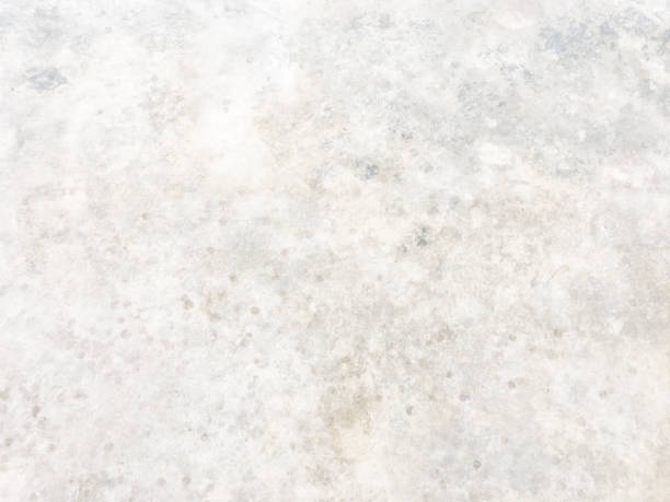istock Dry aged Concrete wall with moss in the area. Texture image or background 1752090146