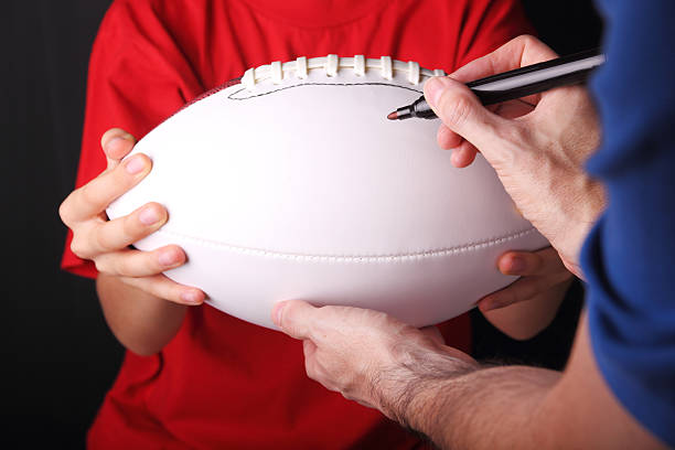 istock Young Football Fan Getting An Autograph 175209077