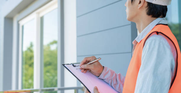 istock inspector or engineer is inspecting construction and quality assurance new house using a checklist. Engineers or architects or contactor work to build the house before handing it over to the homeowner 1752099289