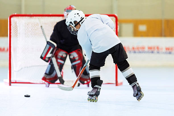 istock Little league kids roller hockey training 175209994