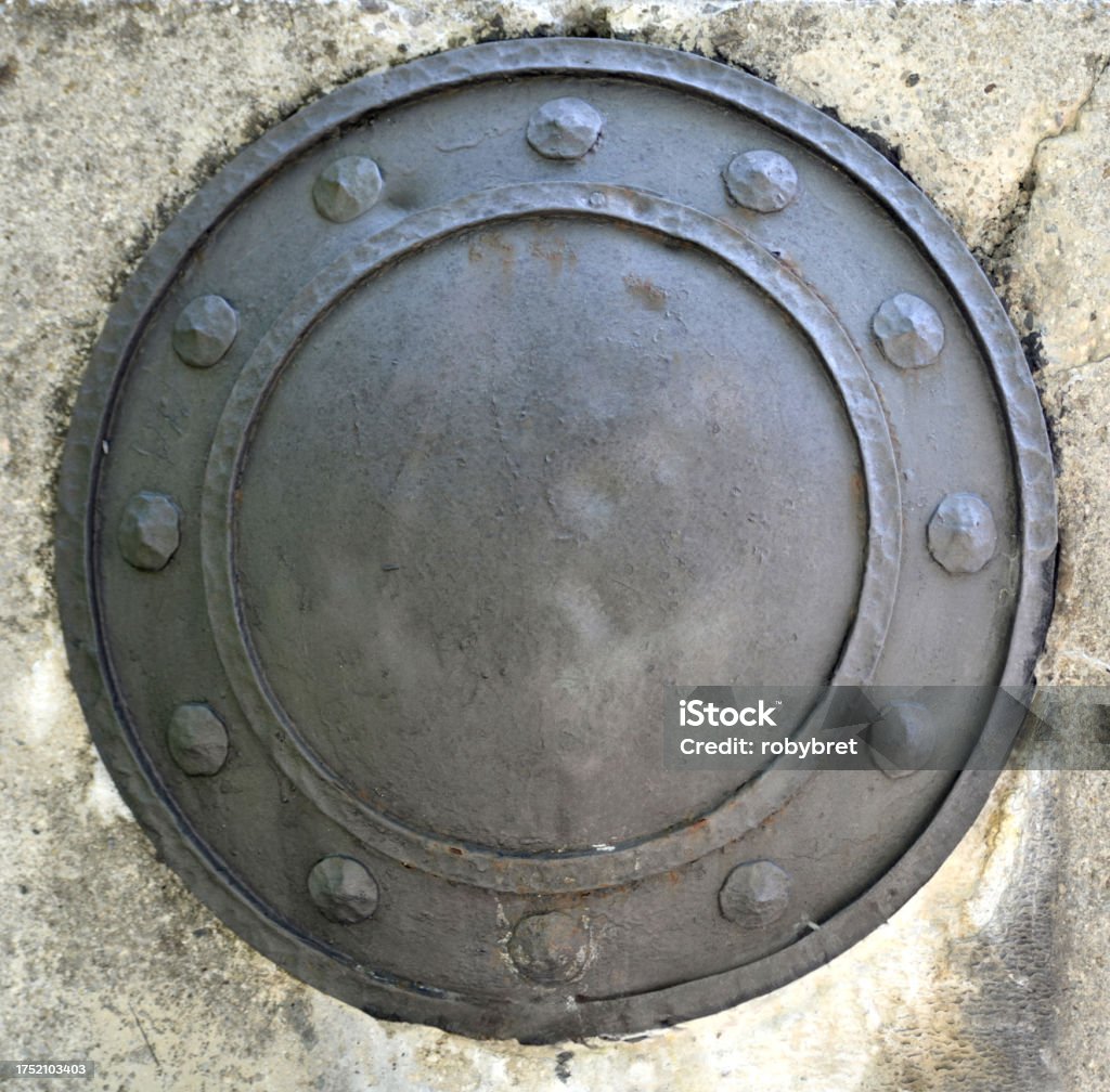 Decorative metal shield A round ornamental metal shield Medieval Stock Photo