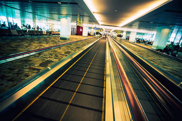 istock Moving Walkway in Departure Lounge and People Waiting 175210485