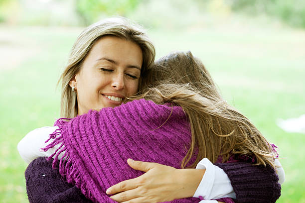 istock Mother and daughter hugging 175210608