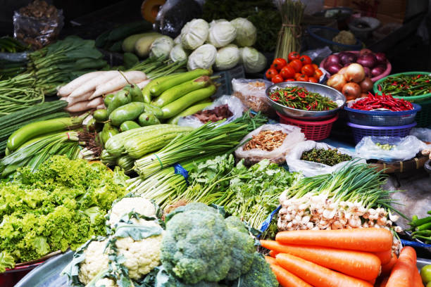 istock fresh greens. basil, tomatoes, cucumbers and pepper on a wooden board. fresh summer vegetables 1752107380