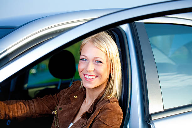 istock attractive blond teenager in her car 175211022
