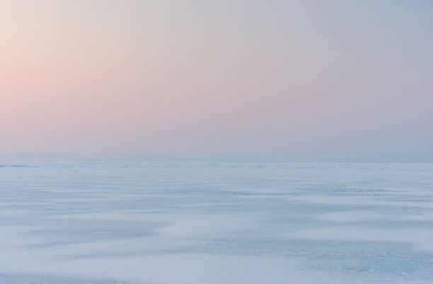 istock Snowdrifts on the ice surface during sunset. 1752114180