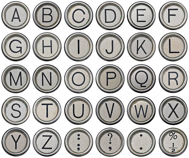 Antique Typewriter Alphabet Keys Antique typewriter alphabet isolated on a white background, lined up with precision to ensure easy cut-out. typebar stock pictures, royalty-free photos & images