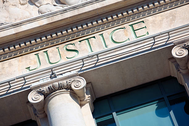 istock Courtroom building with the word justice 175211694