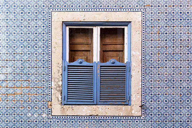 "Beautiful window ornate with tiles (Azulejos) at an old house in Lisbon Portugal).For more tiles and mosaics, please look here:"