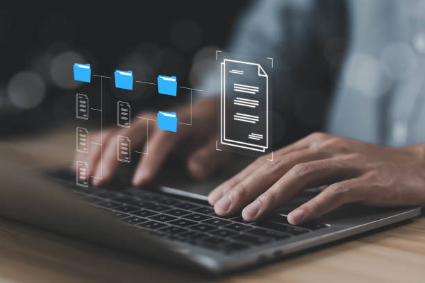 istock businessman manages data document electronic files digital on a laptop 1752124945