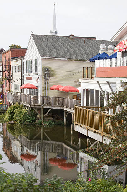 istock Reflections in river, shops and restaurants at Camden Maine 175212851