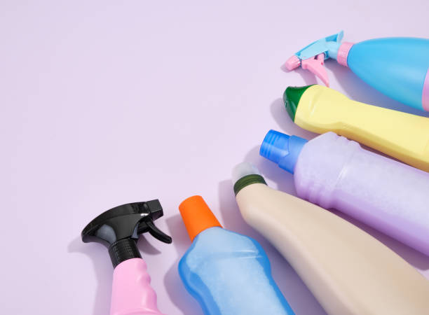 istock Different cleaning products on a purple background. Cleaning service concept. Copy space for text. 1752131324