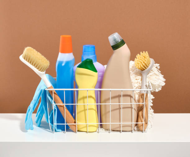 istock White basket with cleaning and detergent set. Brushes, rags, rubber gloves. 1752131886
