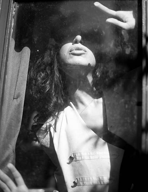 istock Women at window sill 175213283