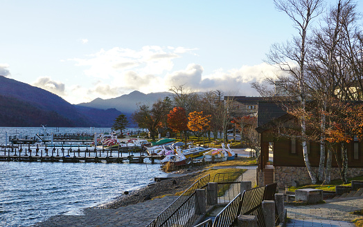 Nikko, Japan - Nov 3, 2014. Autumn scene of Chuzenji lake at sunset in Nikko, Japan. Nikko is a town at the entrance to Nikko National Park, most famous for Toshogu.